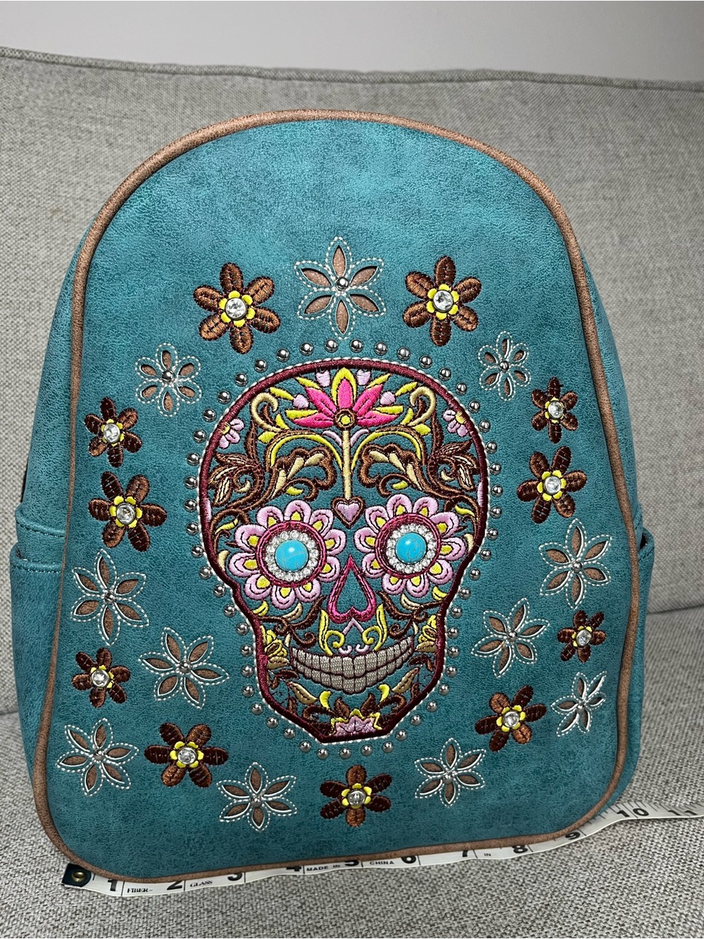 Montana West Turquoise Faux Suede Backpack with Embroidered Scull Accents